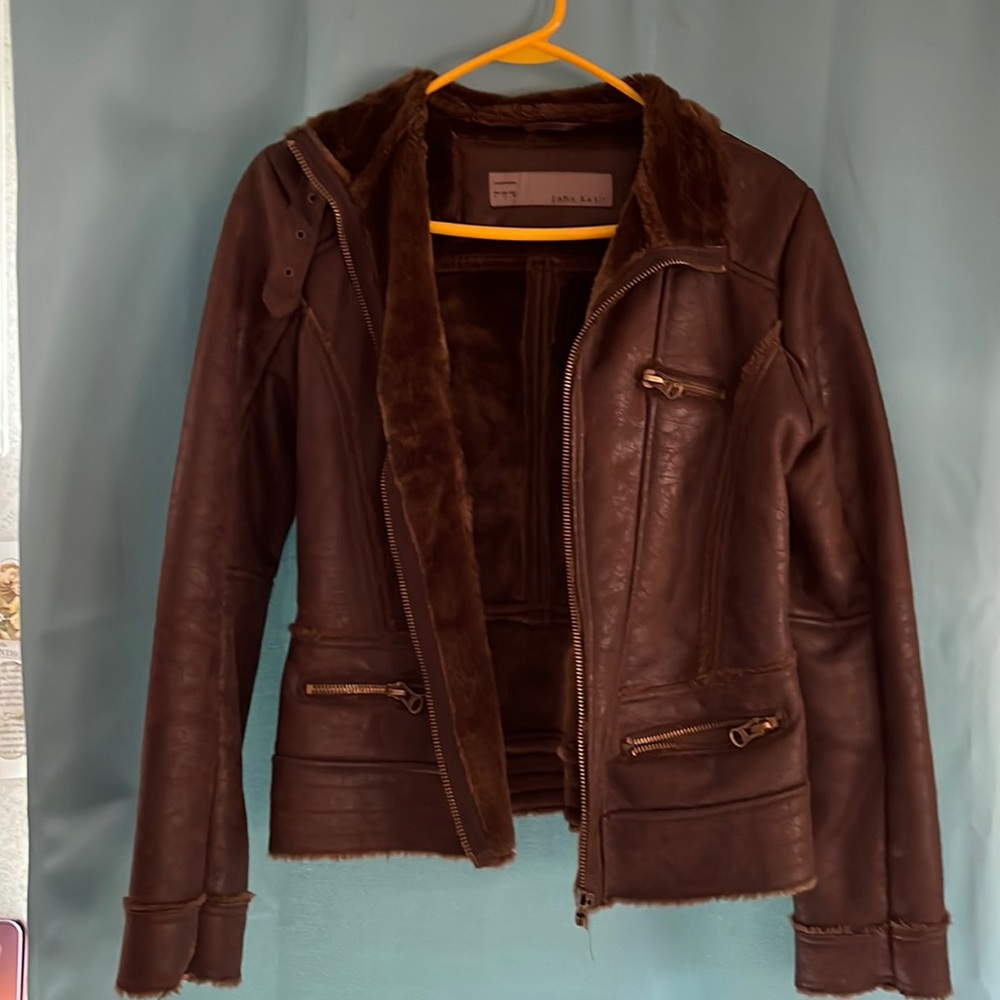 Leather jacket with fur in the inside. In very good condition.